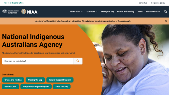 National Indigenous Australians Agency homepage with search bar, quick links, and image of two people embracing