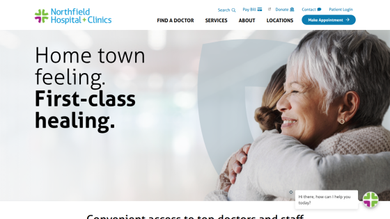 Northfield Hospital + Clinics homepage with slogan 'Home town feeling. First-class healing.' and navigation options