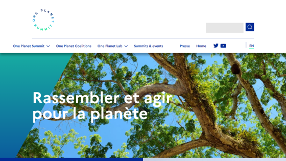 Website header with navigation and hero section showing a tree and text about acting for the planet