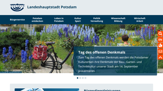 Website for Potsdam with a bicycle and flowers, promoting an open monument day event.