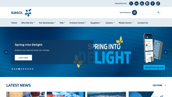 Sasol homepage featuring a blue hero section with 'Spring Into Delight' and navigation links.