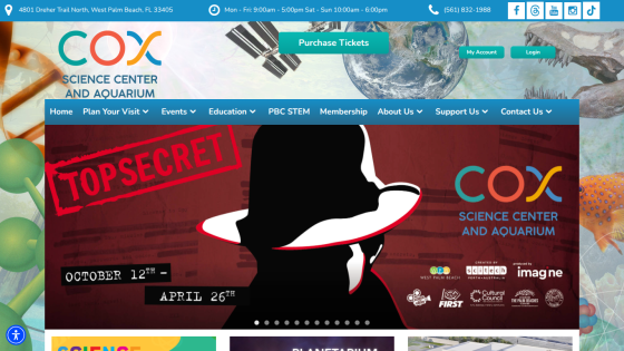 Homepage with navigation bar, hero image of a mountain landscape, and headline 'Explore the world with us'
