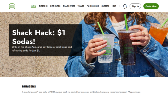 Promotional banner for $1 sodas with drinks in hand and burger section below.