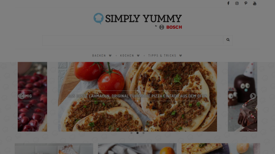 Simply Yummy website homepage with navigation and hero image of Turkish pizza Lahmacun