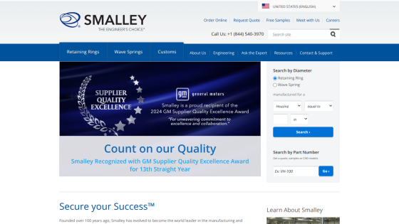 Smalley website header with navigation and hero section highlighting GM Supplier Quality Excellence Award and search options