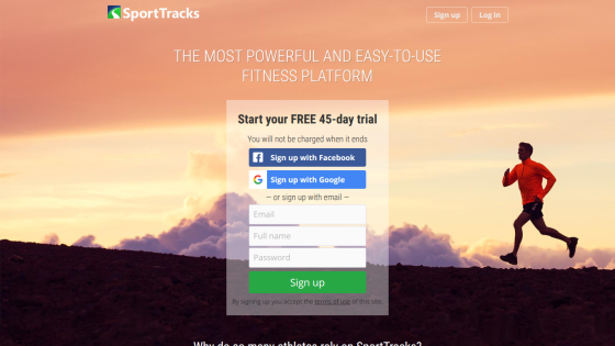 SportTracks fitness platform homepage with sign-up options and a runner silhouette at sunset
