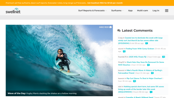 Surf report website featuring a surfer riding a wave with latest comments section.
