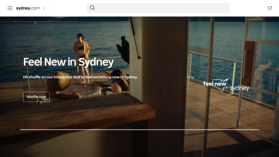 Promotional banner for Sydney with the text 'Feel New in Sydney' and a scenic view.