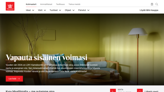 Homepage with green living room wall, sofa, lamp, and text about 2026 color theme Kameleontti
