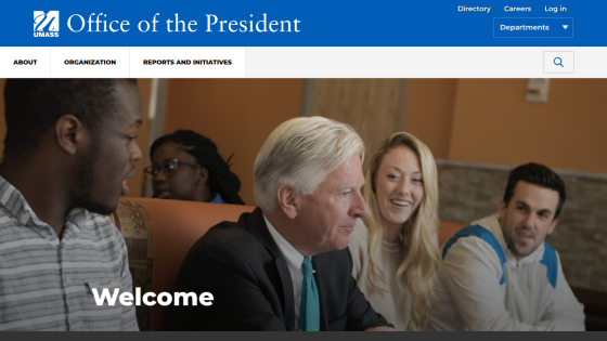 UMass Office of the President website with navigation and a welcome message over an image of diverse people conversing