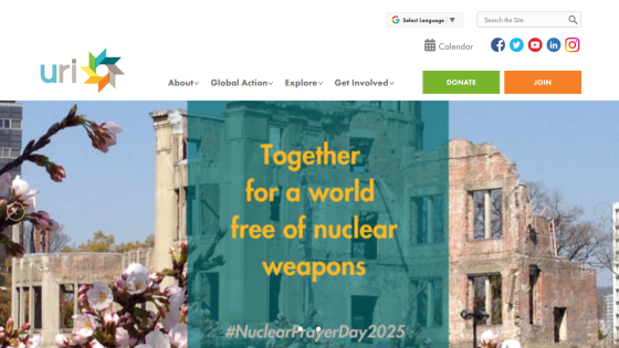 Website promoting a world free of nuclear weapons with a background of a historic building and cherry blossoms