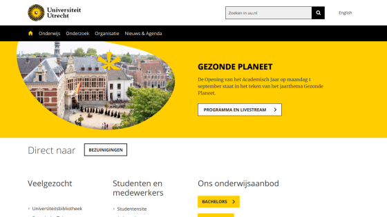 University website homepage featuring a yellow banner and a scenic image with program links.