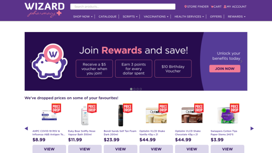 Wizard Pharmacy homepage with rewards program banner and price drop offers on health products