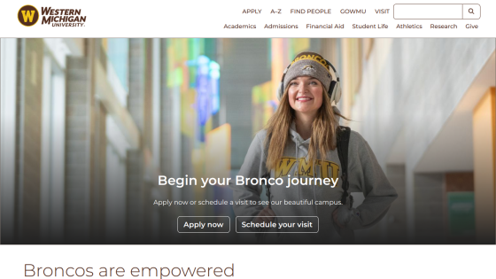 Homepage of Western Michigan University featuring a smiling student and calls to action for applying and scheduling a visit.