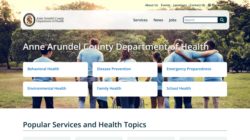 Anne Arundel County Department of Health homepage with navigation and health service categories over a group photo