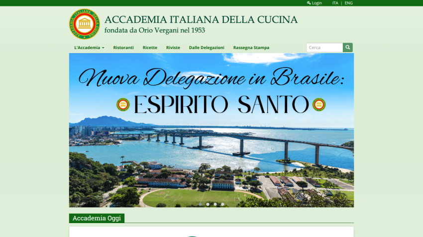 Accademia Italiana della Cucina homepage featuring a book cover on traditional regional cuisine and 2025 theme announcement