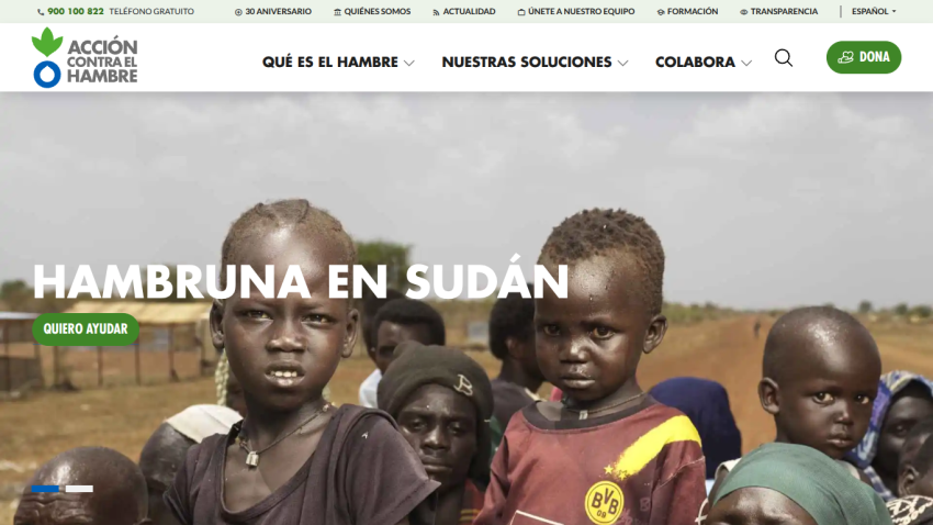 Charity website header with navigation and hero section showing a child receiving medical care, promoting aid for Gaza