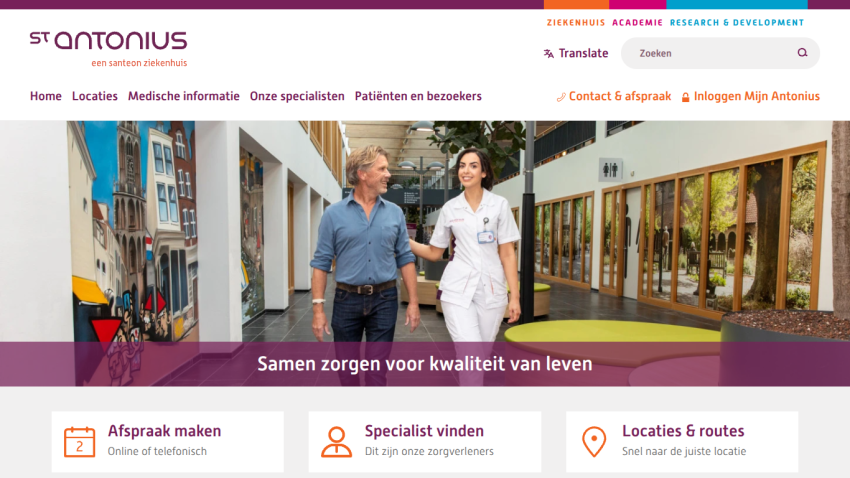 Homepage of St Antonius with header, navigation, hero image of two people walking, and main service buttons