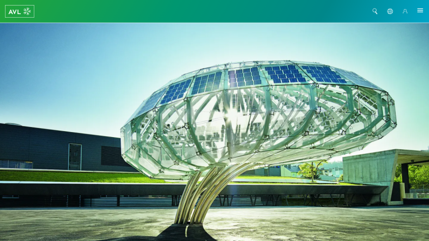 A modern solar tree sculpture with solar panels, set in a landscaped area.