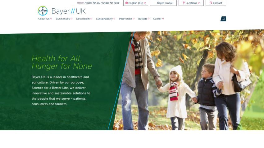 Bayer UK homepage with navigation menu and hero section promoting healthcare and agriculture solutions with family image