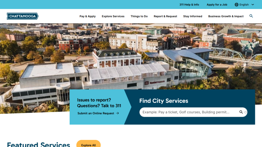 Homepage with navigation bar, large hero image featuring a woman in a yellow jacket, and headline text about a new collection