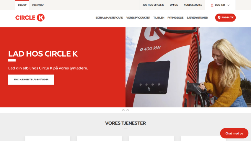 Circle K website hero promoting electric car charging with a call to find nearest charger and a woman using a charger