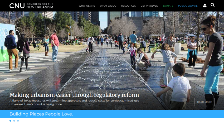 Website promoting urbanism with a fountain and people enjoying a park.