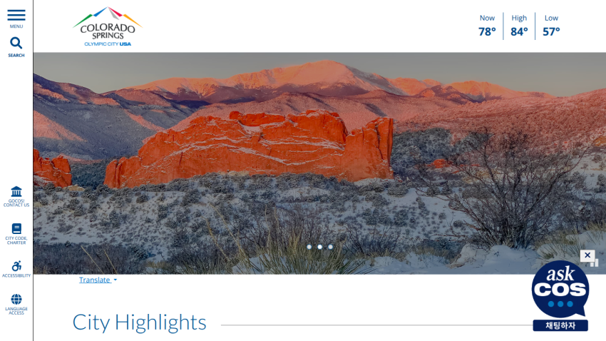 Homepage of Colorado Springs featuring a scenic red rock landscape and weather information.