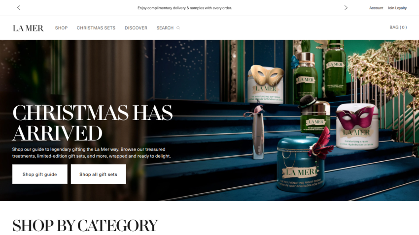La Mer website hero section promoting Christmas gift sets with product images and shopping options