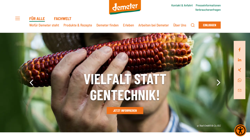 Website promoting biodiversity over genetic engineering with a hand holding red corn and a call to action button