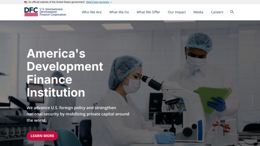 Homepage of America's Development Finance Institution with headline, subtext, and scientists in lab coats using microscope