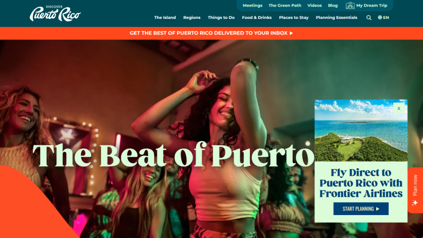 Vibrant scene showcasing dancing people with the text 'The Beat of Puerto Rico' prominently displayed.