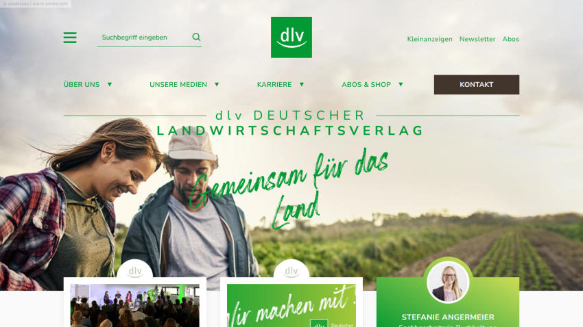 Homepage of Deutscher Landwirtschaftsverlag with navigation menu and hero section showing two people outdoors and slogan Gemeinsam für das Land