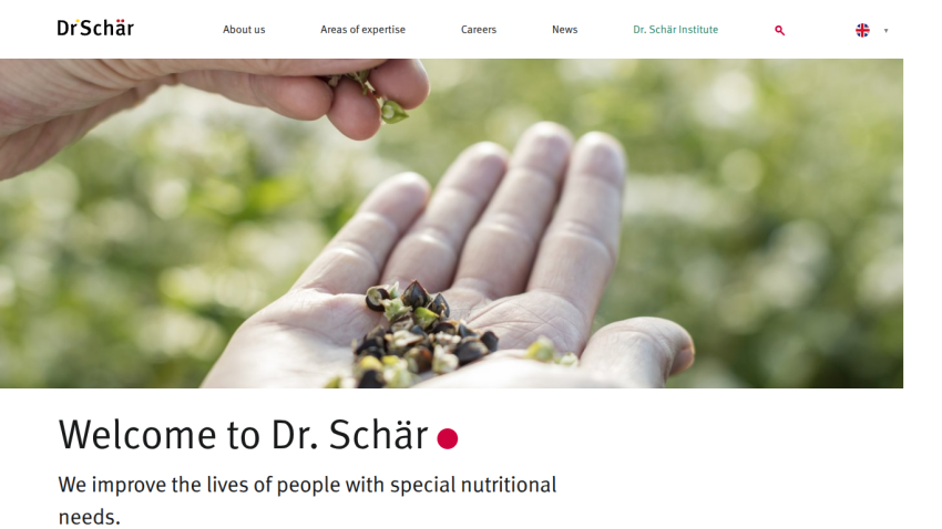 Website header and hero section with hands holding seeds and welcome message about improving lives with special nutritional needs.