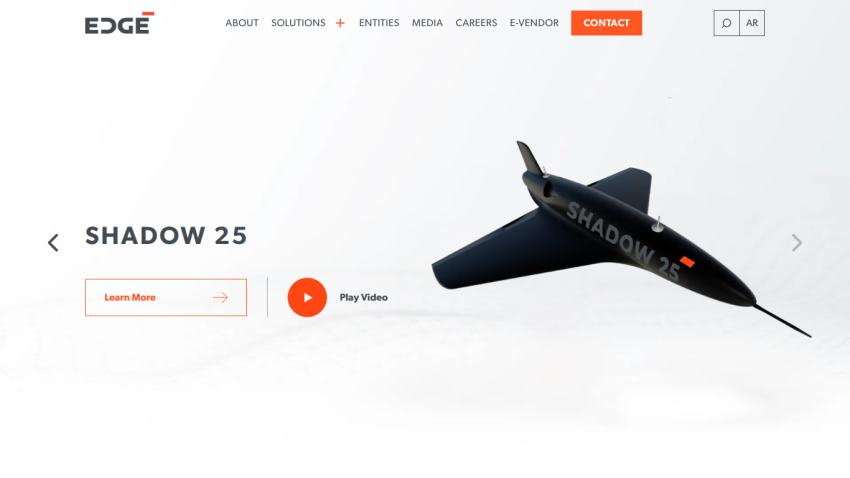 Website hero section with navigation menu and a large image of a black aircraft labeled SHADOW 25, featuring buttons for 'Learn More' and 'Play Video'