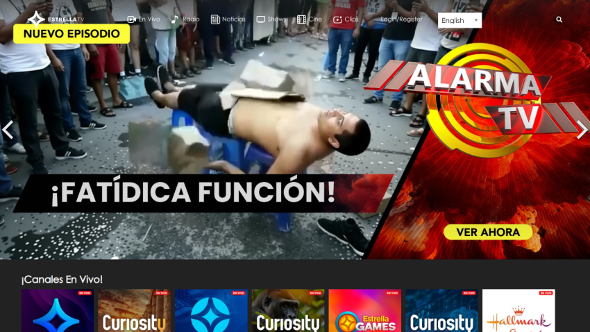 Streaming site Estrella TV with a featured episode titled ¡Fatídica Función! and live channels including Curiosity and Hallmark