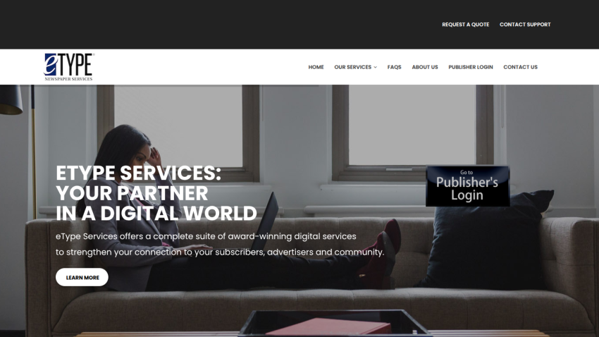 eType Services homepage with headline about digital services and a woman using a laptop on a sofa