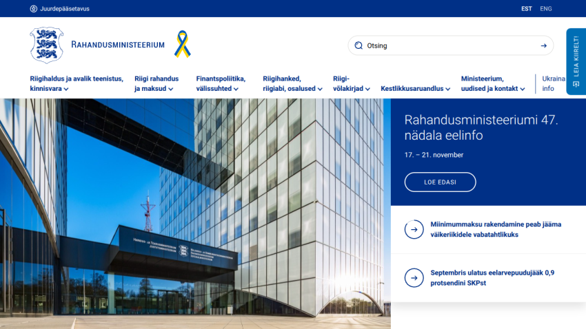 Estonian Ministry of Finance website with navigation menu, hero image of government building, and weekly info for November 17-21