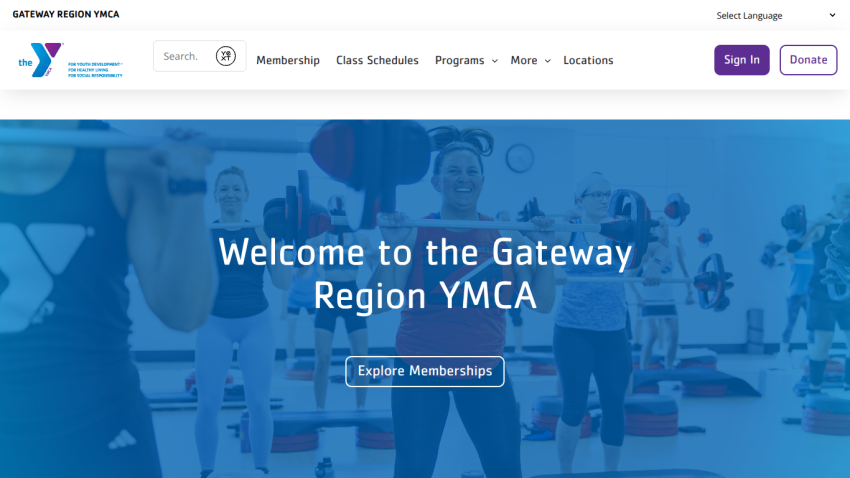 Gateway Region YMCA homepage with navigation and a group fitness class in session