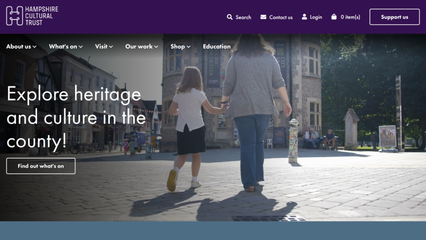 Hampshire Cultural Trust homepage with navigation and a family exploring heritage exhibits