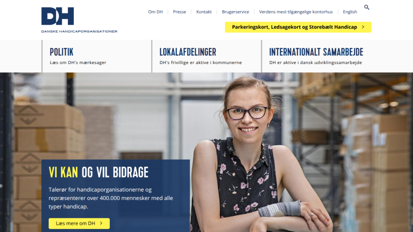 Danske Handicaporganisationer website with navigation and hero section featuring a smiling woman and text about representing people with disabilities.