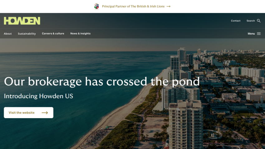 Howden website announcing the launch of Howden US with a coastal cityscape background and navigation menu
