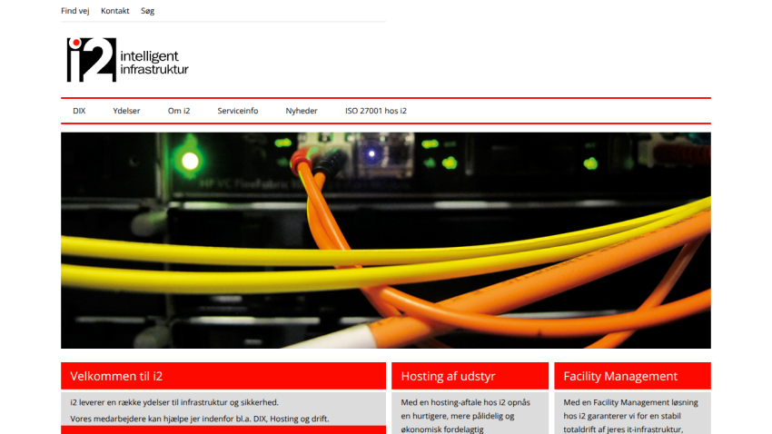 Website header with navigation menu and hero image showing network cables