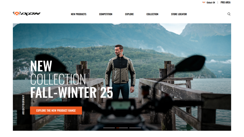 Homepage showcasing new Fall-Winter 25 collection with a man standing on a dock by a lake and mountains in the background