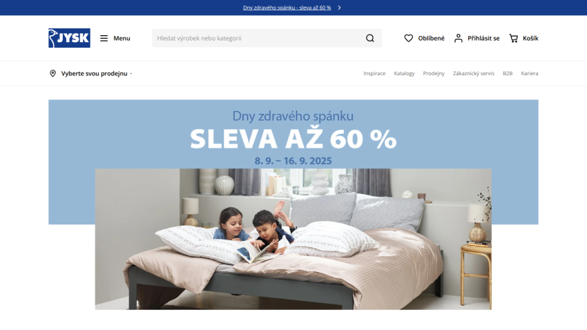 Promotion for bedding sale with children on a bed, highlighting a 60% discount.