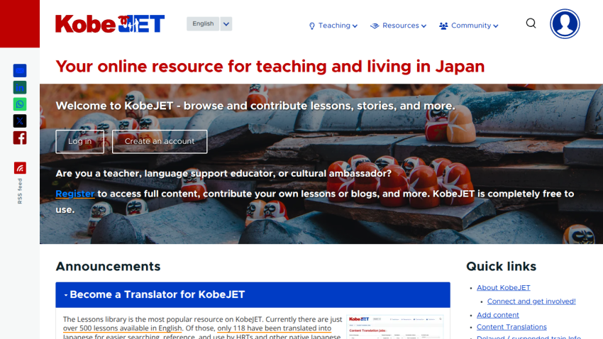 Website header with logo and menu, headline about teaching and living in Japan, and an image of traditional Japanese Daruma dolls on roof tiles