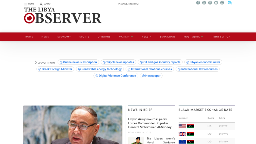 The Libya Observer homepage with news headlines, navigation menu, and a photo of a man speaking.