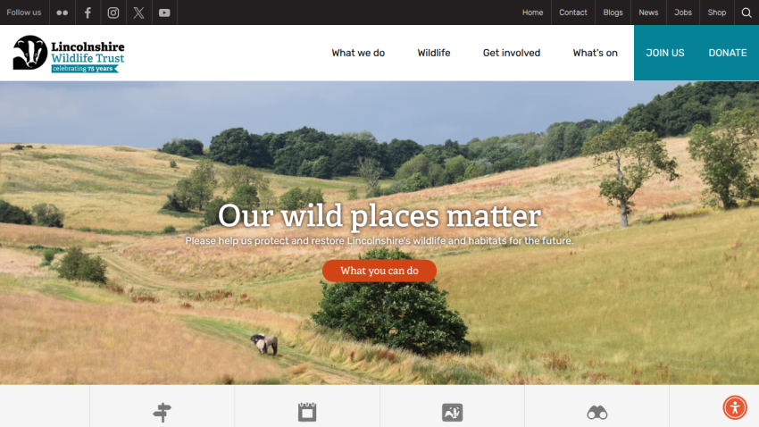 Lincolnshire Wildlife Trust homepage with a scenic landscape and call to action to protect wildlife
