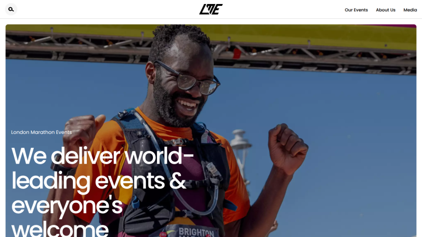Homepage showcasing a smiling participant celebrating at an event with a welcoming message.