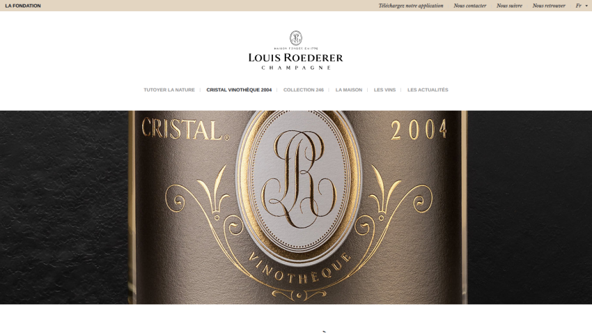 Louis Roederer Champagne website featuring Cristal Vinothèque 2004 with navigation menu and top links